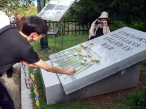 Man Paying Tribute to Unknown Civilian's Memorial